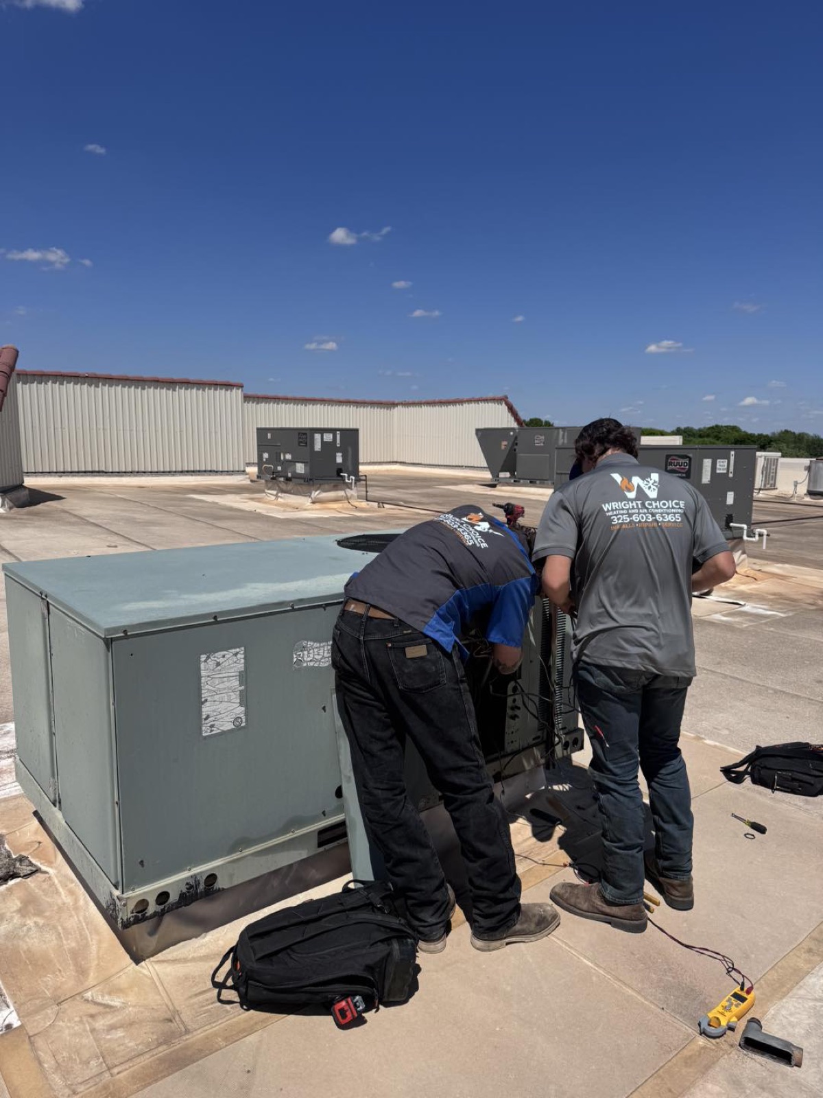 Wright Choice technician servicing a heat pump at a rural Cross Plains, TX ranch home